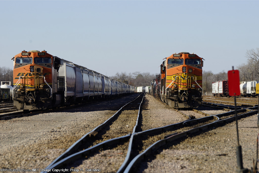 BNSF 6126 (H-TEAEGW 1-17A) and BNSF 5088 (H-TEAPTX 1-18A_ await their crews and departure times